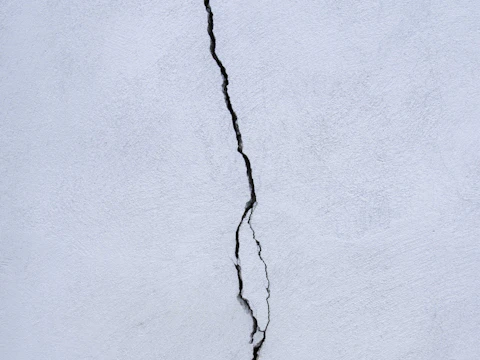 Crack running along the side of a building wall