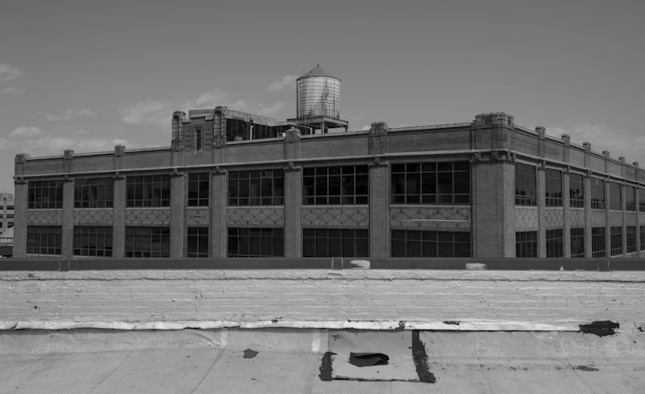 Historic industrial building with a rooftop water tower